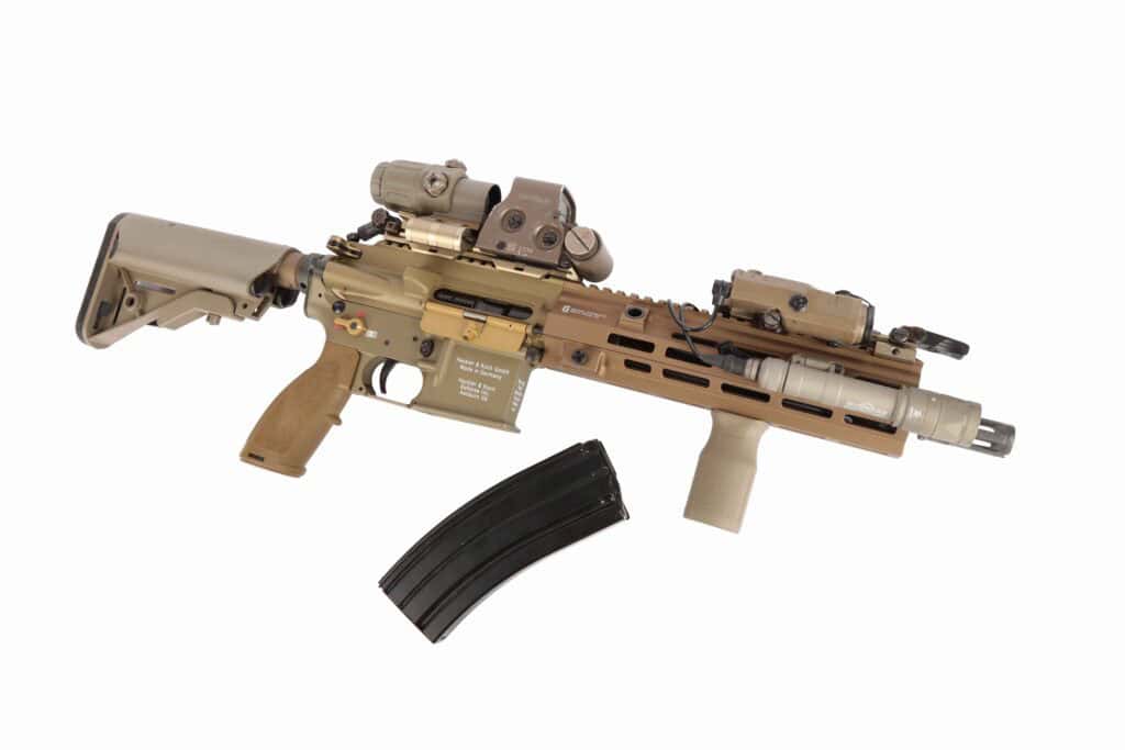 High-quality tactical sniper rifle with advanced scope, flashlight, and accessories for military operations.